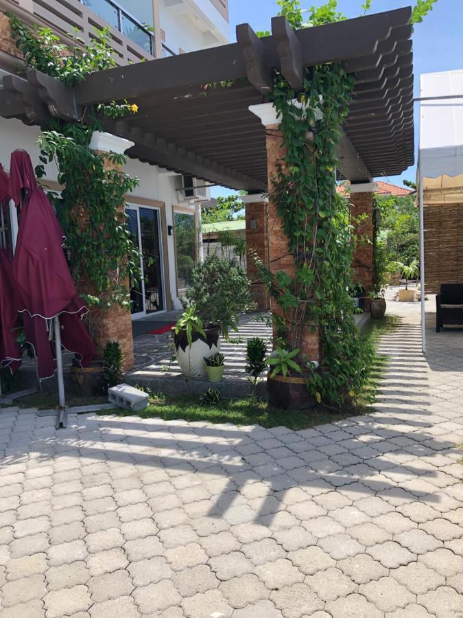 Em Royalle Hotel & Beach Resort سان خوان المظهر الخارجي الصورة