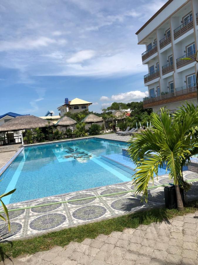 Em Royalle Hotel & Beach Resort سان خوان المظهر الخارجي الصورة
