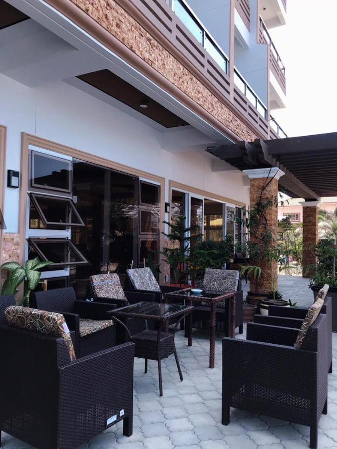 Em Royalle Hotel & Beach Resort سان خوان المظهر الخارجي الصورة